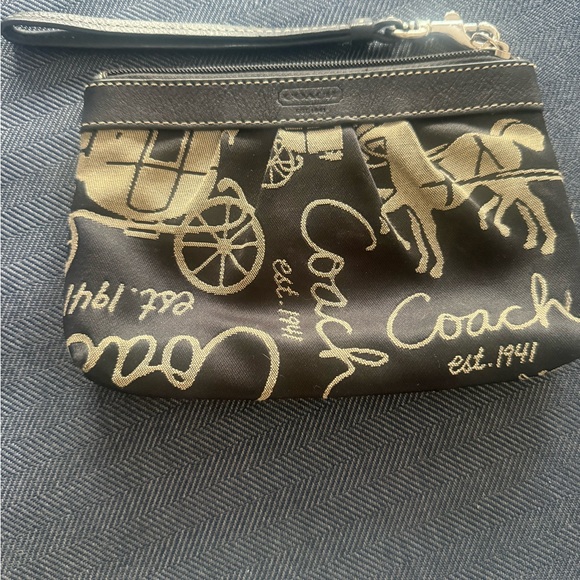 Coach Handbags - Coach Black and Gold Signature Script Wristlet: missing tag